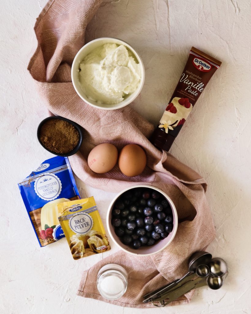 Easy gluten free and guilt free healthy blueberry cheesecake in an iron pan