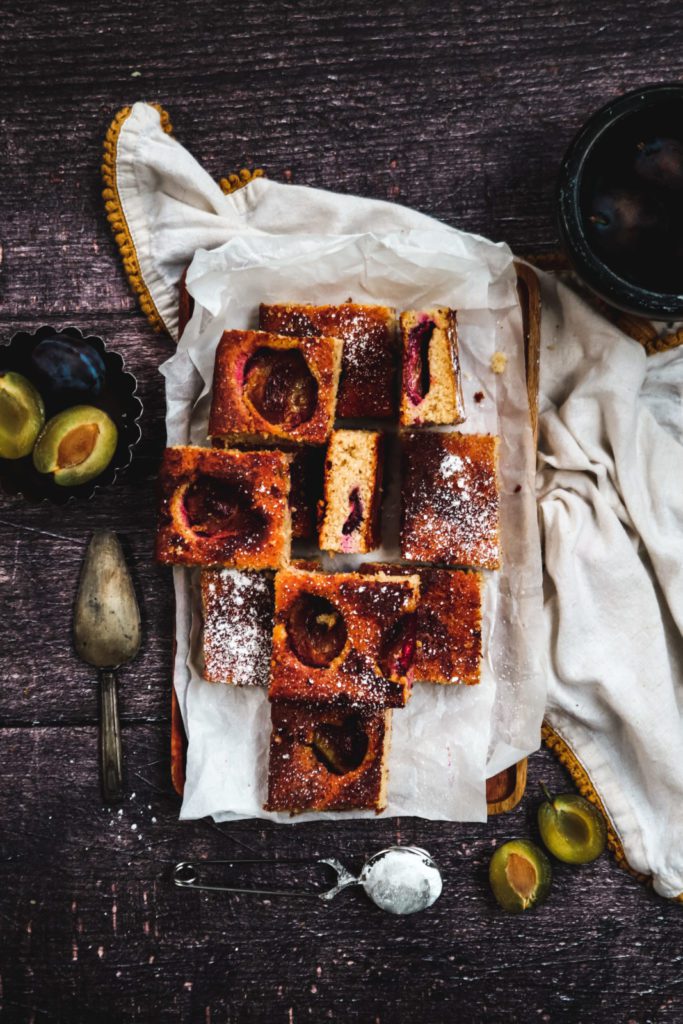 Sheet cake squares aranged on a baking paper