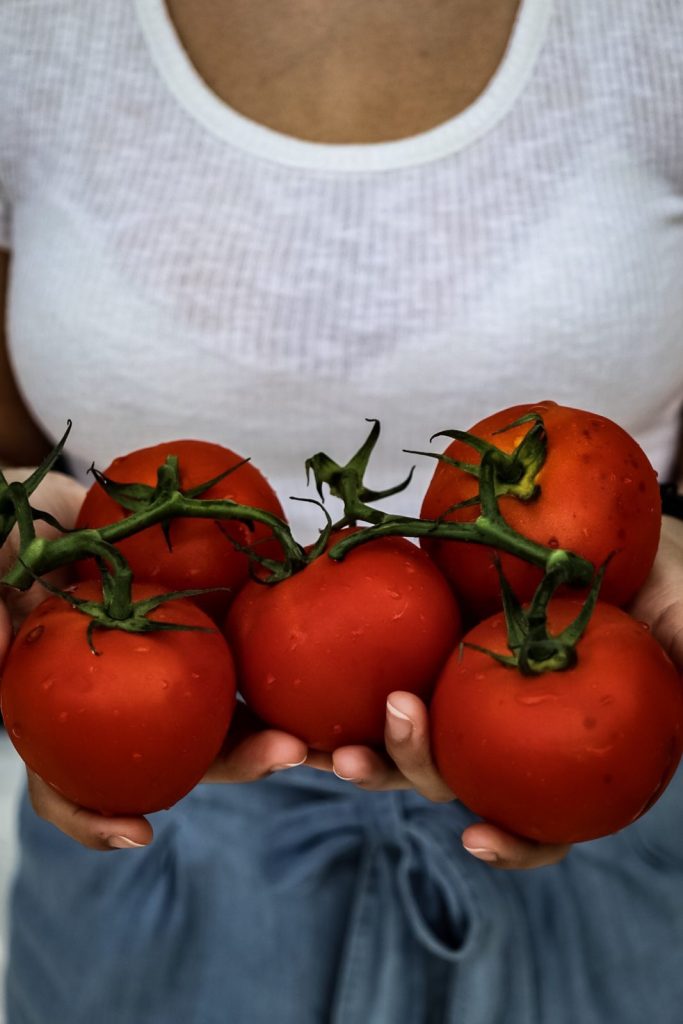 Tomatoes and hands