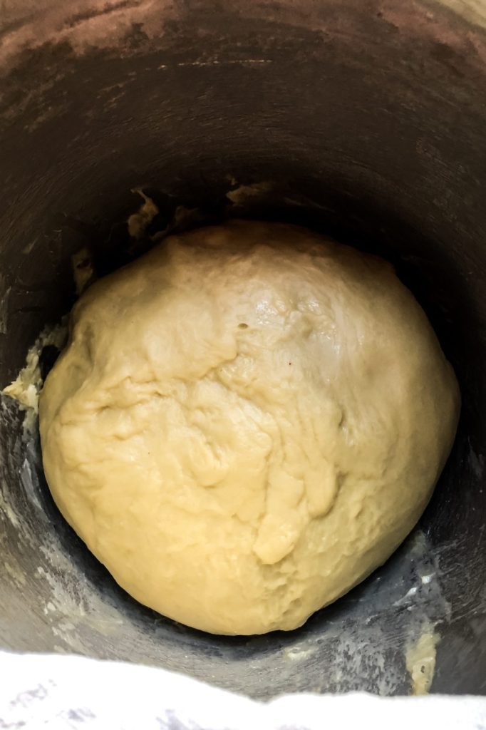 Brioche dough in a bowl before rising