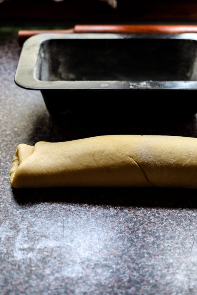 Dough rolled up into a log