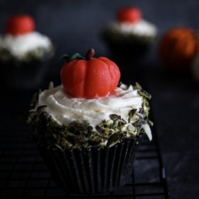 Pumpkin Cupcake with Vanilla cream cheese frosting and marzipan pumpkin