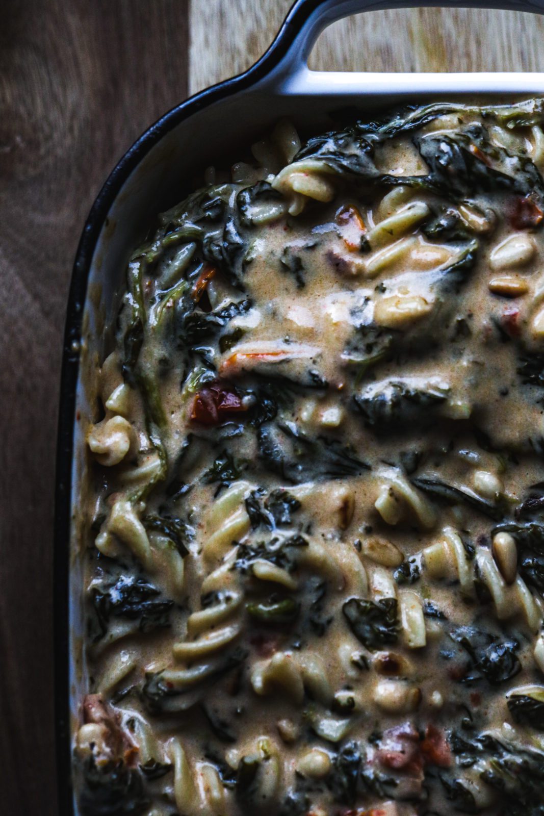 Smoky vegan Mac and Cheese with sun dried tomatoes and spinach