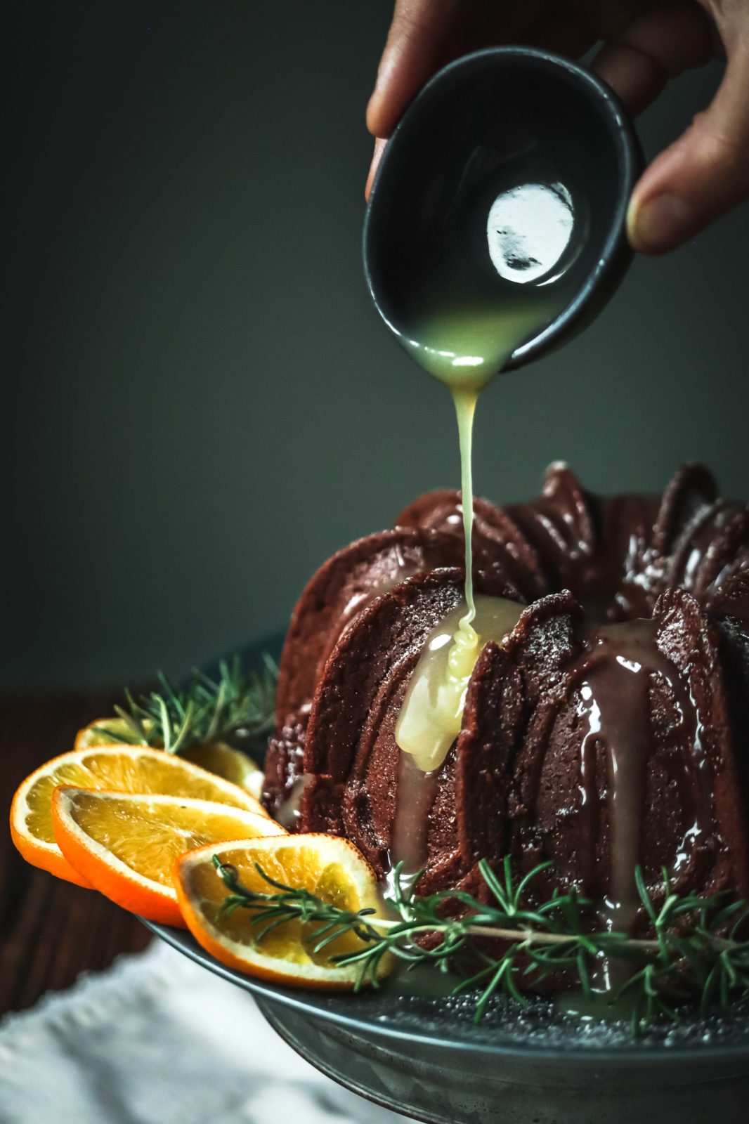 Chocolate orange bundt cake with orange flavored caramel sauce