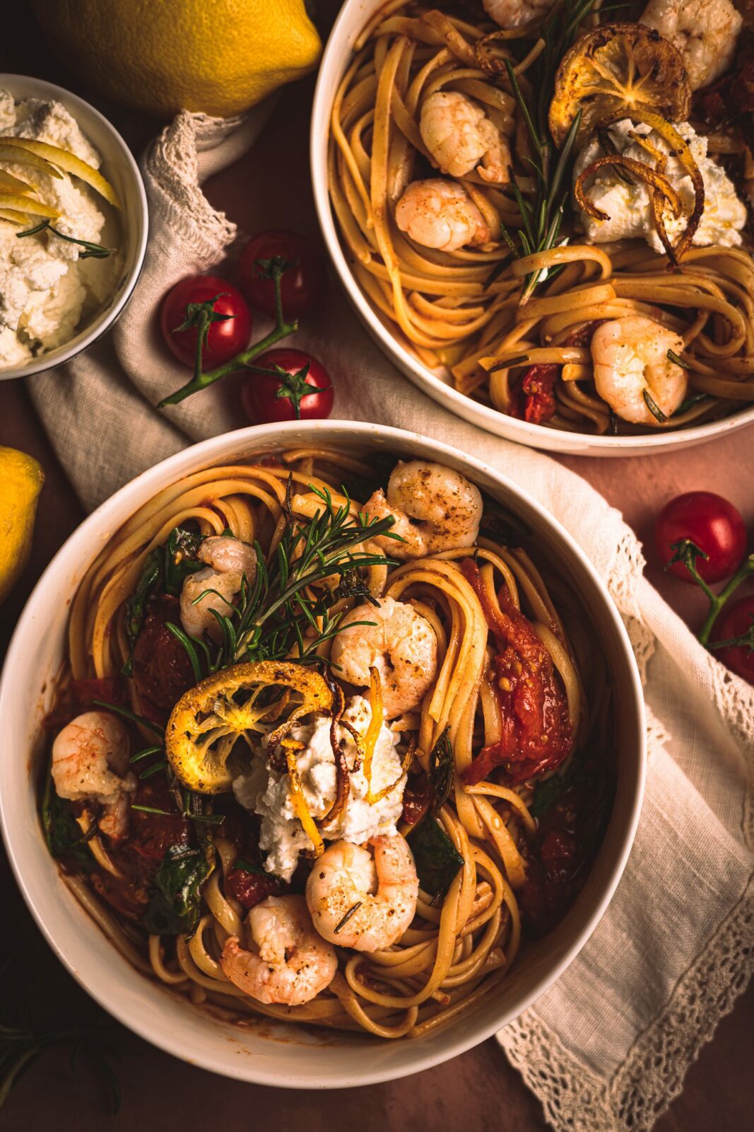 Most delicious cherry tomato and ricotta pasta recipe with spinach and fried rosemary and lemon shrimps